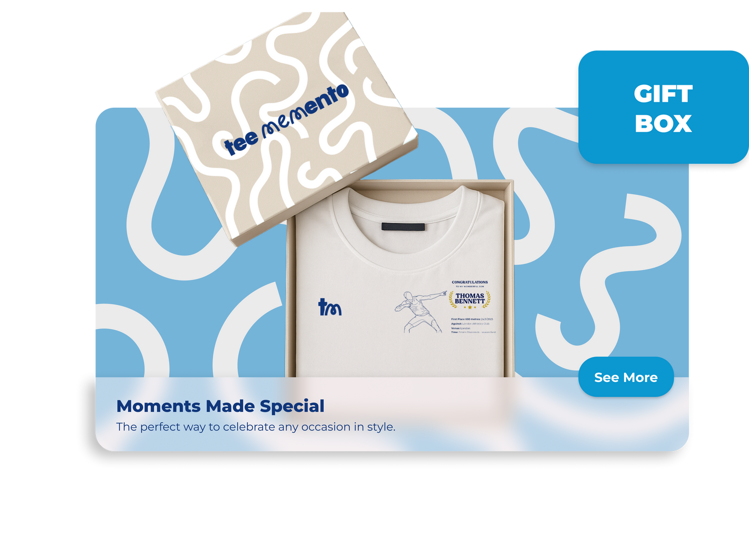 White t-shirt with a logo in a 'tee memento' gift box on a blue and white patterned background celebrated with TeeMemento