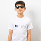 Person wearing a white t-shirt with logos on a plain background - showing the TeeMemento athletics motif and personalisation