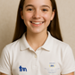 Young girl wearing a white polo shirt with logos on a beige background showcasing a TeeMemento product