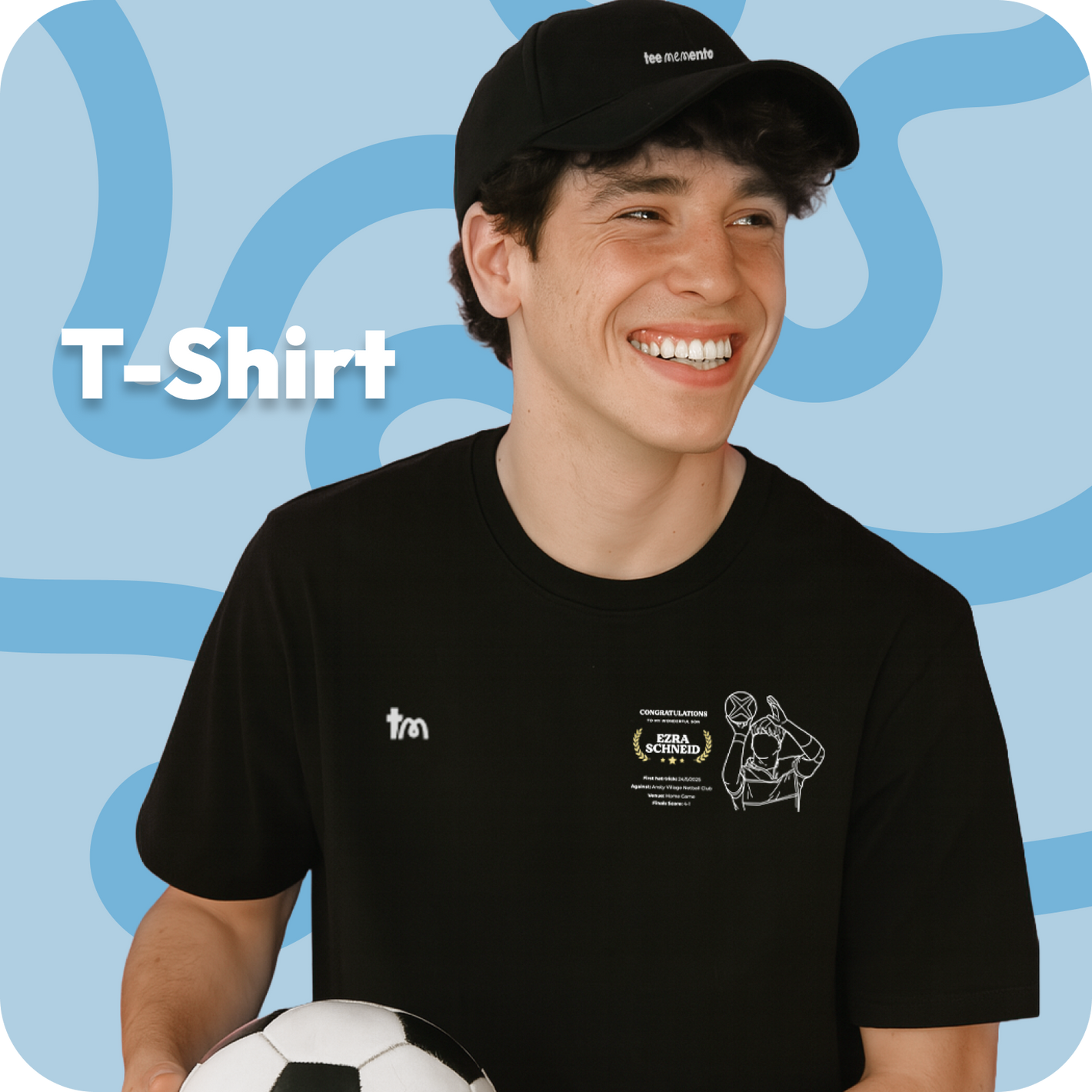Person wearing a black t-shirt with graphics and text, holding a soccer ball against a blue background with 'T-Shirt' text celebrated with TeeMemento, showcasing one of the brilliant designs